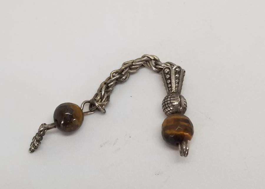 ÜZERİ KAPLAN GÖZÜ TAŞLI GÜMÜŞ KAPLAMA TESPİH PÜSKÜLÜ