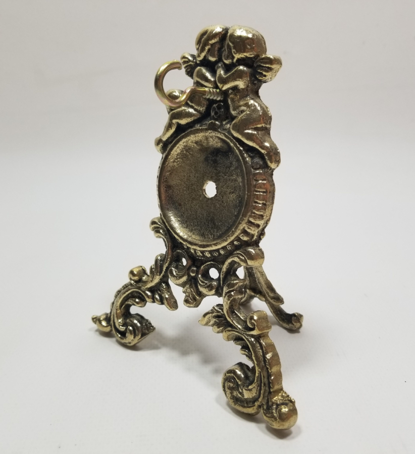 KABARTMA İŞÇİLİKLİ ANTİKA METAL SAAT STANDI