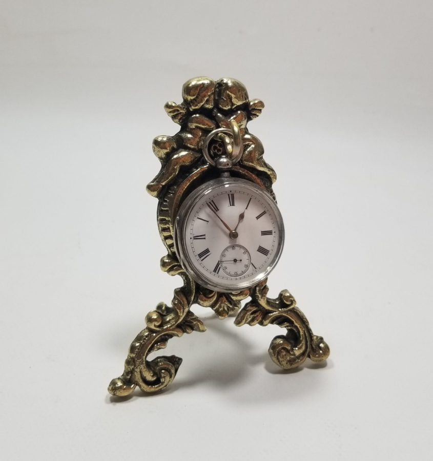 KABARTMA İŞÇİLİKLİ ANTİKA METAL SAAT STANDI