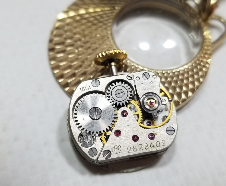 ALTIN KAPLAMA KURMALI ANTİKA KOLYE SAAT