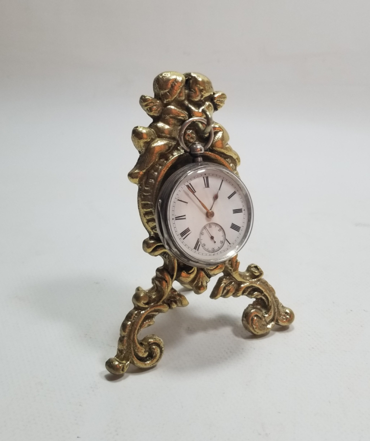 KABARTMA İŞÇİLİKLİ ANTİKA METAL SAAT STANDI