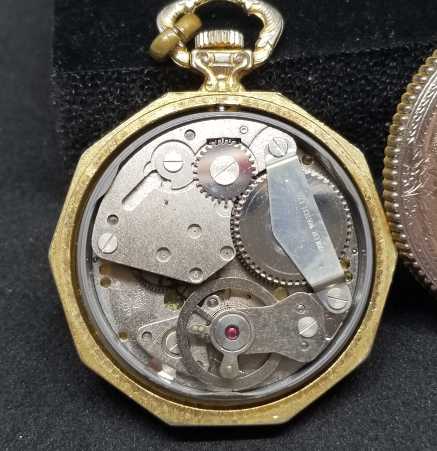 ALTIN KAPLAMA KURMALI ANTİKA KOLYE SAAT