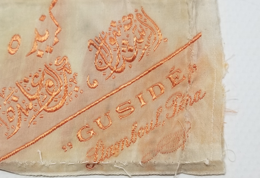 OSMANLI DÖNEMİ NADİR OSMANLICA VE FRANSIZCA YAZILI İPEK KIYAFET ETİKETİ