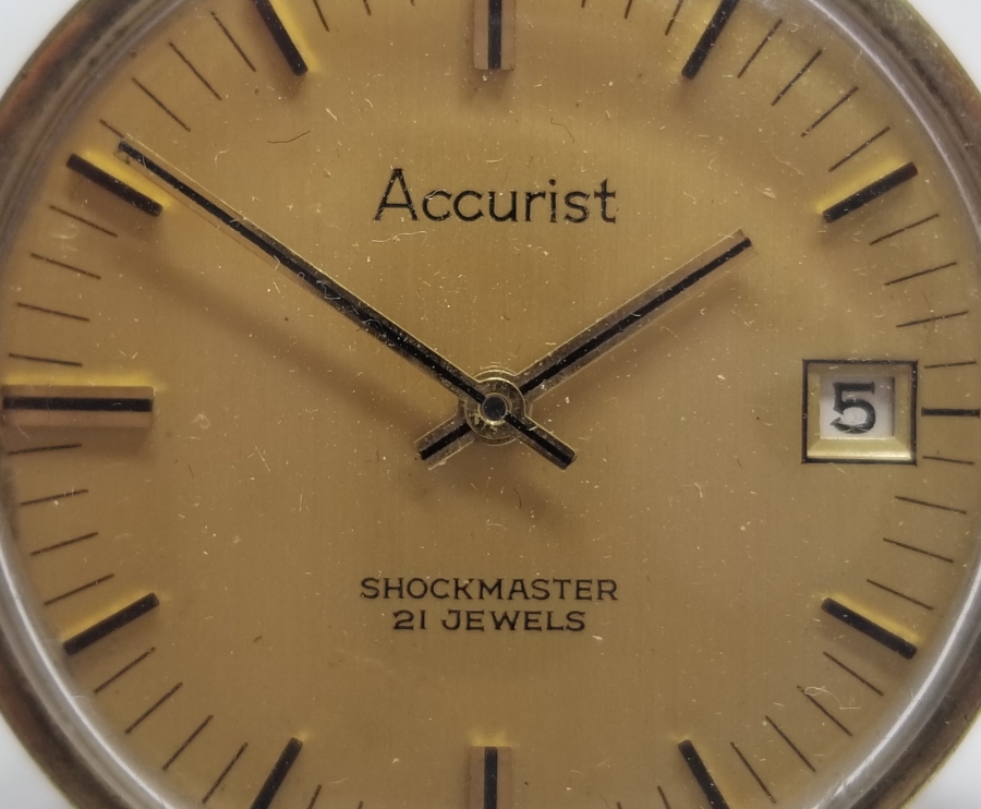 ACCURIST MARKA KURMALI VE TAKVİMLİ ANTİKA KOL SAATİ