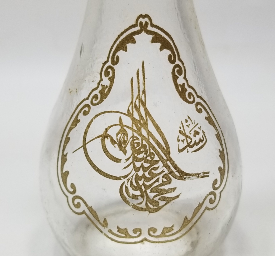 ÜZERİ TUĞRA FORMLU ANTİKA CAM ŞİŞE