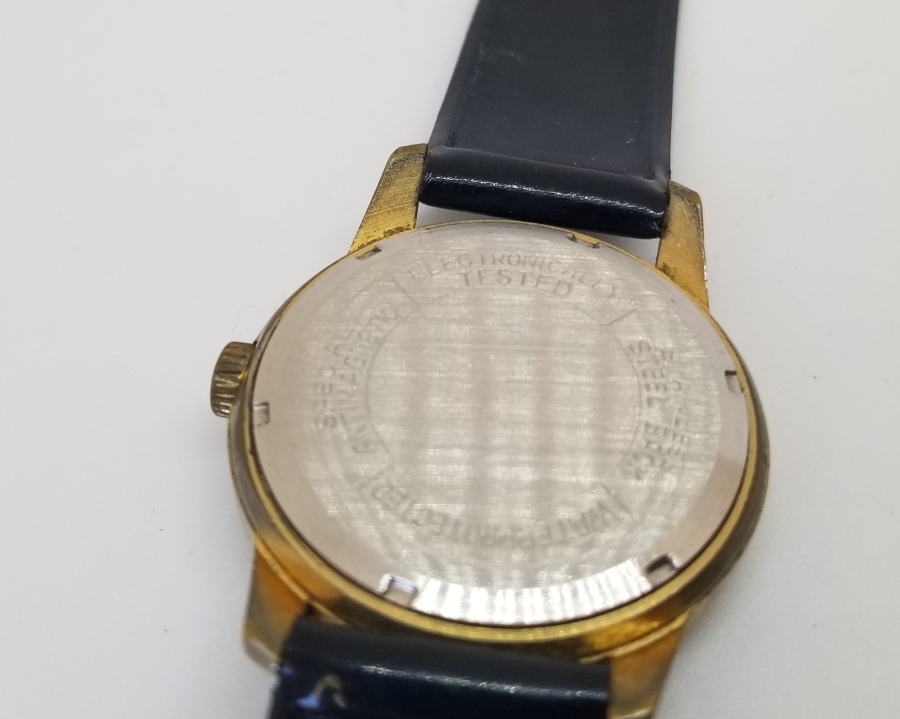 STARMASTER MARKA ALTIN KAPLAMA KURMALI VE TAKVİMLİ KOL SAATİ