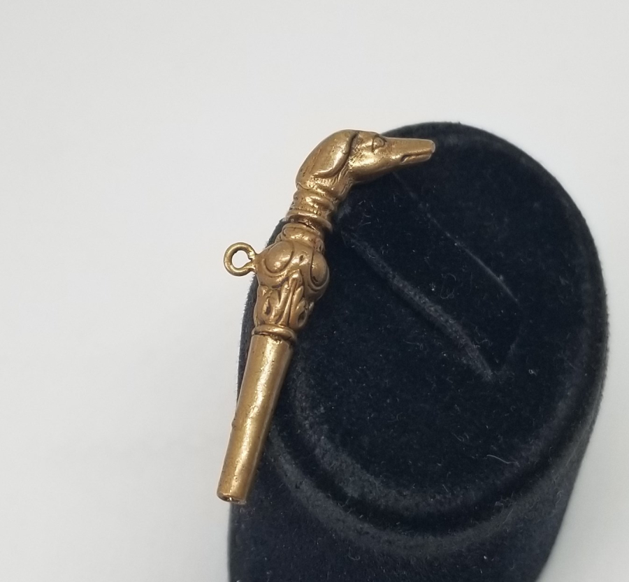 KÖPEK BAŞI FORMUNDA YAPILMIŞ OSMANLI DÖNEMİ CEP SAATİ ANAHTARI