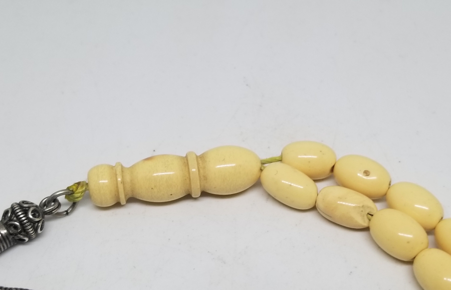 ORİJİNAL GÜMÜŞ PÜSKÜLÜYLE KAYA DAMLA KEHRİBAR TESPİH