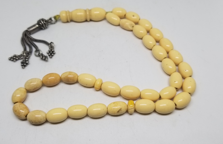 ORİJİNAL GÜMÜŞ PÜSKÜLÜYLE KAYA DAMLA KEHRİBAR TESPİH