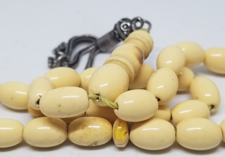 ORİJİNAL GÜMÜŞ PÜSKÜLÜYLE KAYA DAMLA KEHRİBAR TESPİH