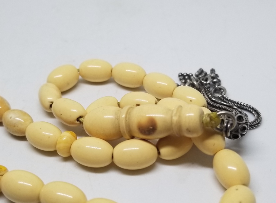 ORİJİNAL GÜMÜŞ PÜSKÜLÜYLE KAYA DAMLA KEHRİBAR TESPİH