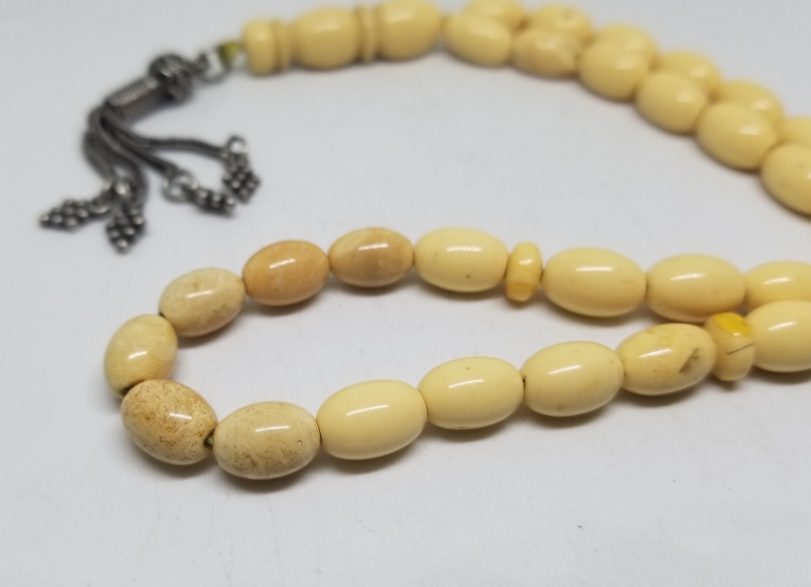 ORİJİNAL GÜMÜŞ PÜSKÜLÜYLE KAYA DAMLA KEHRİBAR TESPİH