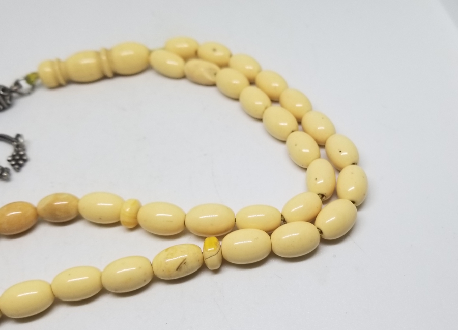 ORİJİNAL GÜMÜŞ PÜSKÜLÜYLE KAYA DAMLA KEHRİBAR TESPİH