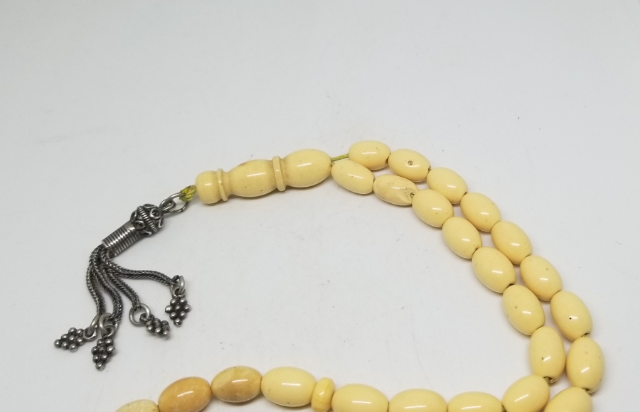 ORİJİNAL GÜMÜŞ PÜSKÜLÜYLE KAYA DAMLA KEHRİBAR TESPİH