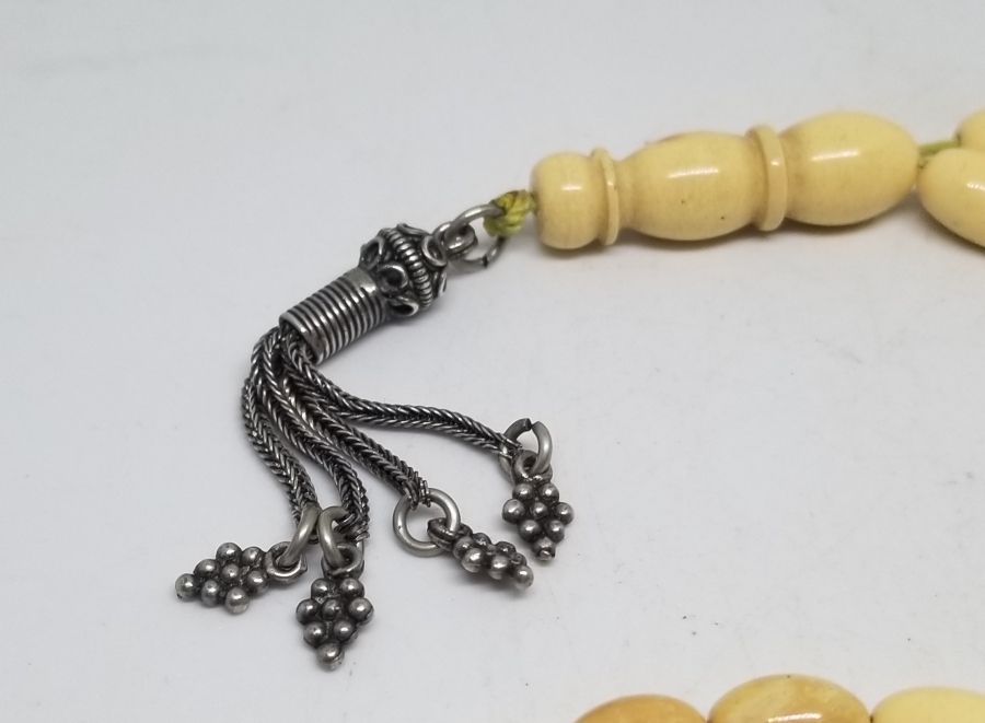 ORİJİNAL GÜMÜŞ PÜSKÜLÜYLE KAYA DAMLA KEHRİBAR TESPİH