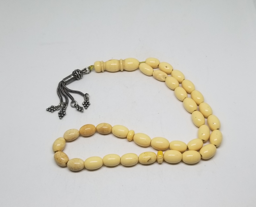 ORİJİNAL GÜMÜŞ PÜSKÜLÜYLE KAYA DAMLA KEHRİBAR TESPİH