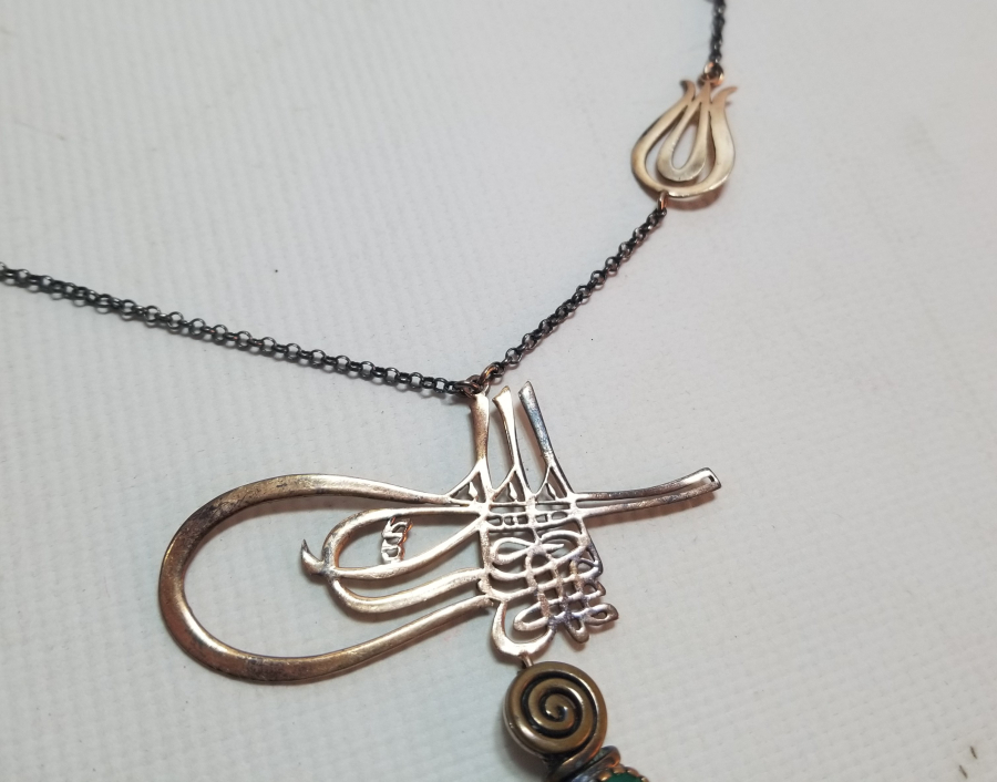 ÖZEL YAPIM TUĞRA FORMLU GÜMÜŞ GERDANLIK