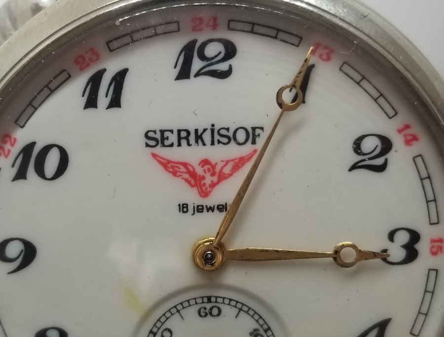 ORİJİNAL KÖSTEĞİYLE ARKASI TRENLİ KURMALI ANTİKA SERKISOF CEP SAATİ